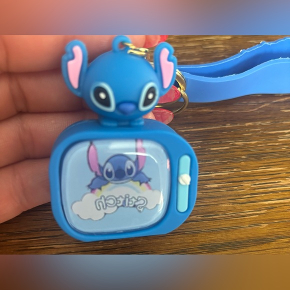 Disney Light Up Stitch on a Rainbow Cloud Keychain - Picture 1 of 5